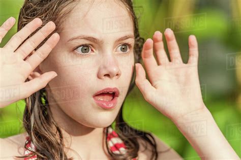 Girl With Surprised Expression Stock Photo Dissolve