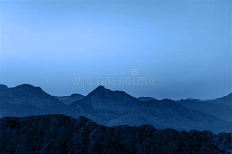 Beautiful Dark Blue Mountain Landscape With Visible Contrast On Blue