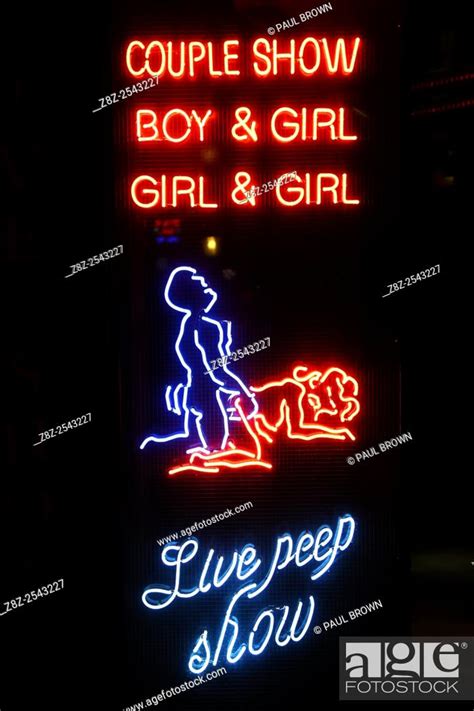 Neon Lights Of The Sex Palace Porn Shop And Sex Show Theatre Showing A Couple Having Sex In A