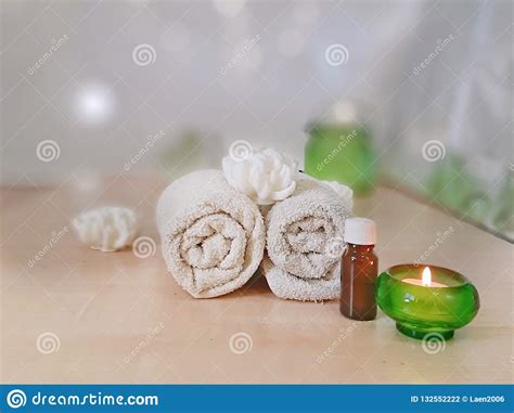 Spa Aromatherapy Concept Towels Essential Oil Candle In Green Glass Handmade Soap Stock