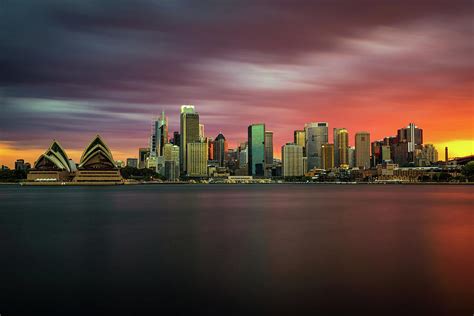 Sunset Skyline Of Sydney Downtown With Opera House Australia