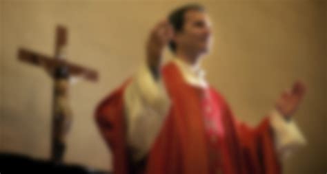 Catholic Priest On Altar Praying During Mass Edmonton Eparchy