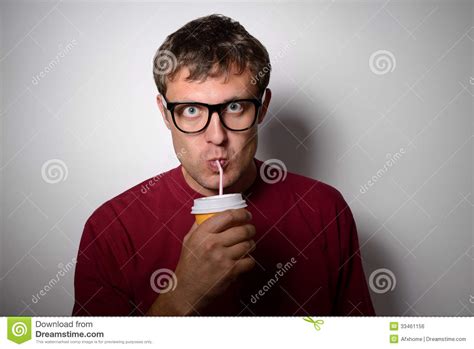 Man Drinking From A Disposable Paper Cup With A Straw Royalty Free Stock Image Image 33461156