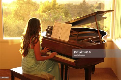 Teenage Girl Playing Piano High Res Stock Photo Getty Images