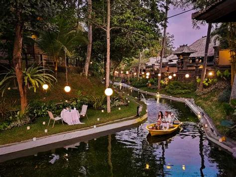 Kamandalu Ubud Romantic Boat Diner In Tropical Lagoon Getyourguide