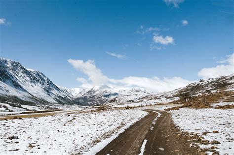 Scenic View Of Snow Capped Mountains During Daytime · Free Stock Photo
