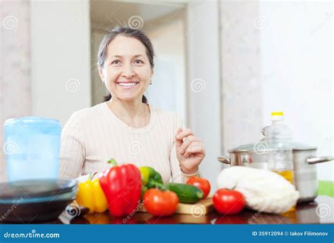 Smiling Mature Woman With Vegetables Stock Photo Image Of Looking
