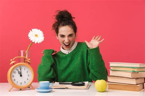 Premium Photo Beautiful Young Nerd Student Girl Sitting At The Table