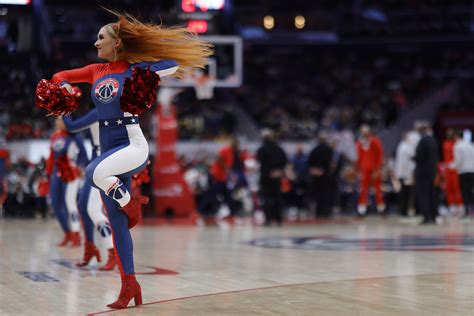 A Member Of The Washington Wizards Dancers Dances During A Timeout