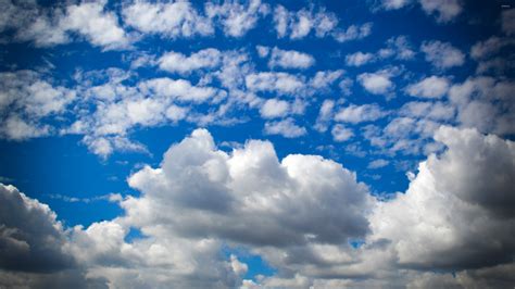 Fluffy Clouds On The Deep Blue Sky Wallpaper Nature Wallpapers 48893