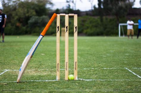 The length of the bat may not be more than 38 inches(965 mm) and width no more than 4.25 inches(108 mm). Stumps at Cricket | Rajat Gupta Photography