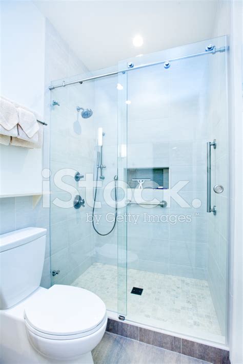 Contemporary Bathroom Design In Residential Home With Walk In Sh Stock
