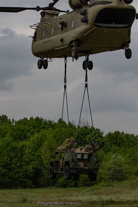 An Army Ground Mobility Vehicle Agmv Is Lowered To Us National