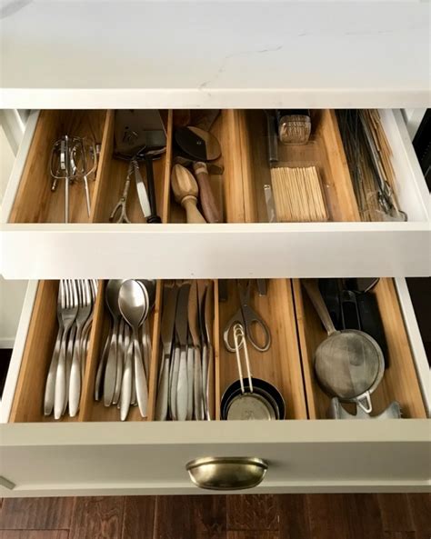 Clever storage for a smart looking kitchen. A Look Inside our IKEA Kitchen Cabinets - Daly Digs