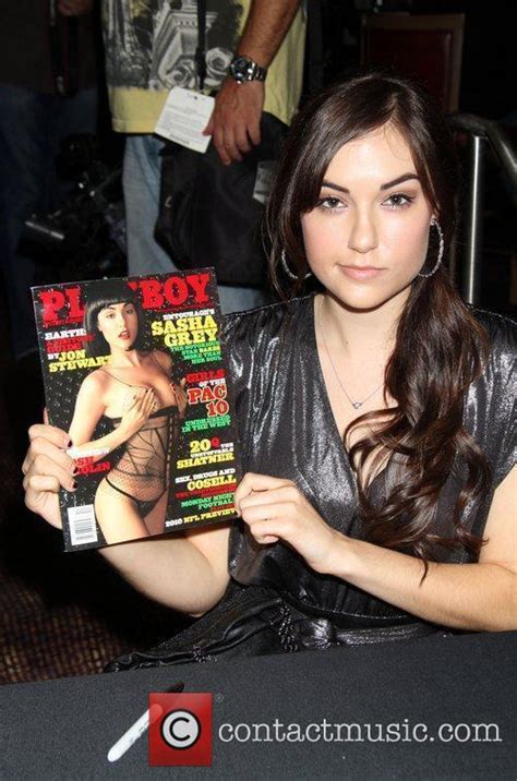 Sasha Grey Signs Copies Of The October Issue Of Playboy Magazine At