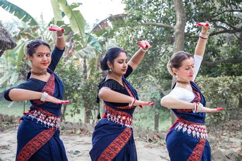 Multinational Group Of Beautiful Young Classical Odissi Dancers Wears