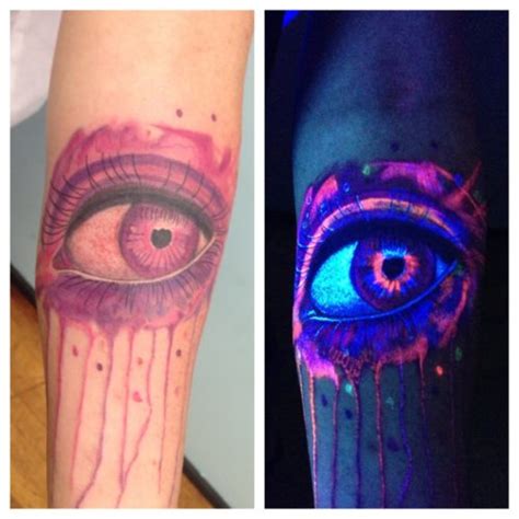 Realsitic Eye Normal And Black Light Uv Tattoo On Forearm