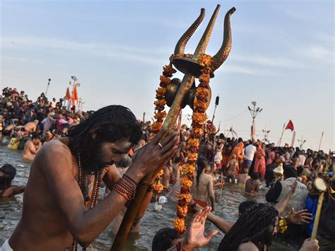 Kumbh Mela 2019 Pics Of Devotees And Naga Sadhus Performing Shahi Snan