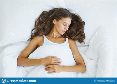 Top View Waist Portrait Of Beautiful Sleeping Woman In Bed Female With Long Hair Resting Stock