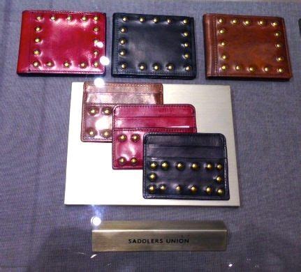 Maybe you would like to learn more about one of these? Barneys studded wallets & credit card case