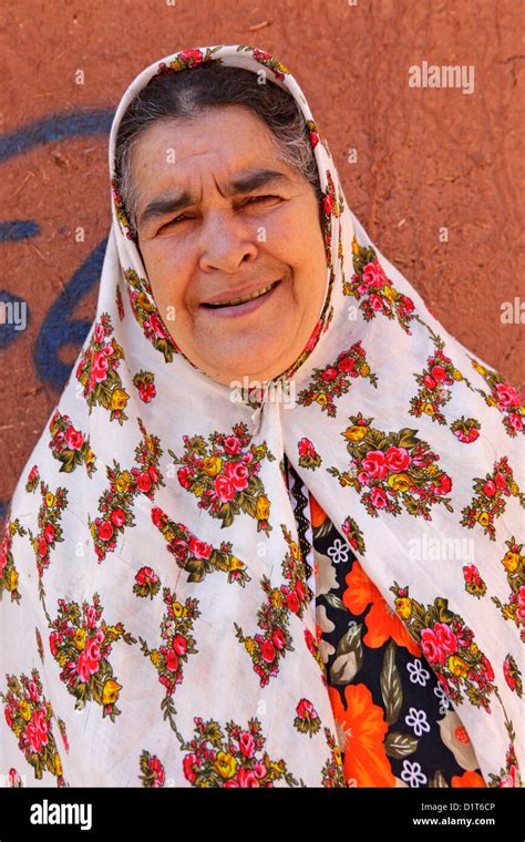 Portrait Of A Iranian Woman Wearing Traditional Floreal Chador Abyaneh