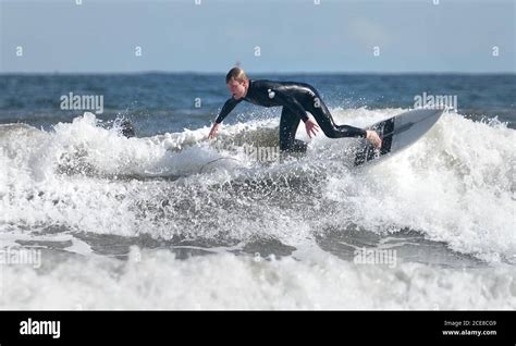 Surfers At Long Sands Beach Tynemouth Stock Photo Alamy