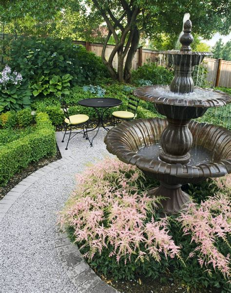 The simple water feature creates an elegant setting, calmed by the soothing sound of running water. All About Garden Fountains - This Old House