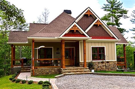 The craftsman home plan evolved from the early bungalow style and usually had low pitched roofs and wide overhangs. Lake Wedowee Creek Retreat House Plan | Rustic house plans ...
