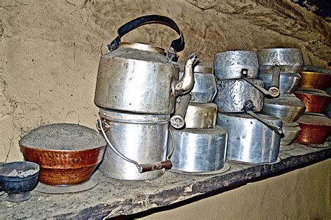 Pots On Display In A Home In Mothers Village In Nepal Photograph By