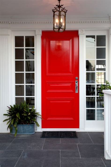 Classic White House With A Red Front Door And Sidelight Red Door