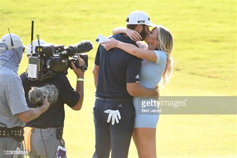 Dustin Johnson Kisses His Girlfriend Paulina Gretzky After Making The