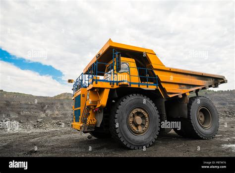 Large Quarry Dump Truck Loading The Rock In Dumper Loading Coal Into
