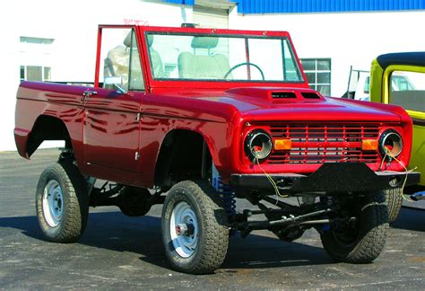 Vintage Red Lifted Ford Bronco Early Ford Small Sports Utility Suv