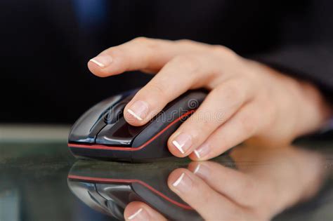 Closeup Of A Female S Hand Working On Computer Mouse Stock Photo