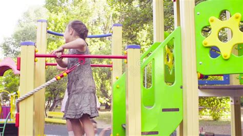Three Girls On A Play Complex On The Playground Stock Video Video Of Smiling Rope 127032199