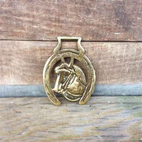 Two of the plaques feature black manes and one's mane is o. Embossed Brass Horse Head Horseshoe Wall Plaque Badge ...
