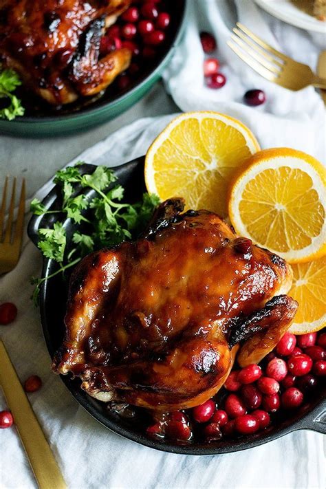 Cornish game hens with garlic and rosemary. This Cranberry Orange Glazed Cornish Hen recipe is perfect for holiday family dinners. | Glazed ...