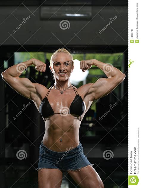 Female Bodybuilder Flexing Muscles Stock Photography Cartoondealer