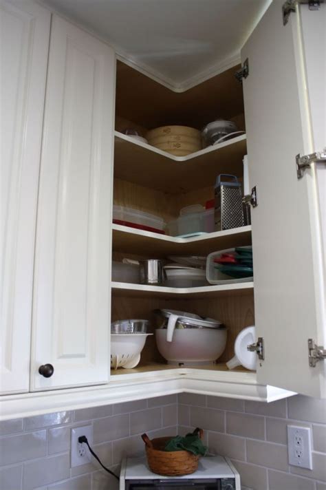 If you want your kitchen to have seamless cabinets, then a diagonal cabinet in the corner is the. upper corner cabinet | Corner kitchen cabinet, Upper ...