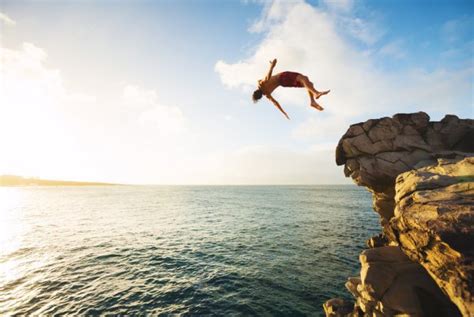Cliff Jumping Extreme At Sunset Stock Image Everypixel