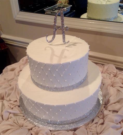 Quilted 2 Tiered Wedding Cake With A Pearl Accent And Rhinestone Bottom