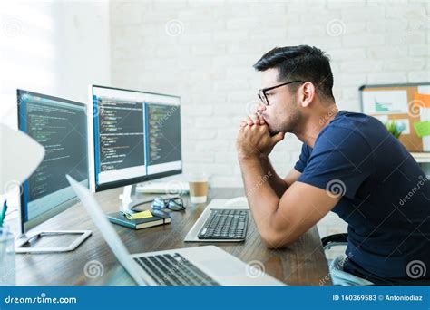 Attractive Male Coding On Computer At Desk Stock Image Image Of