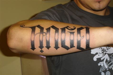 Huge Lettered Angel Word Tattoo On Forearm Tattooimages Biz