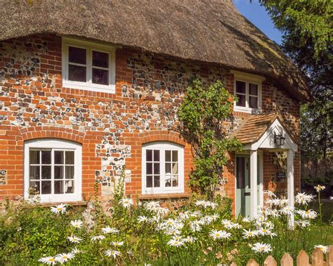 A pretty thatched cottage at Haxton in Wiltshire | Thatched cottage, English cottage garden, Cottage