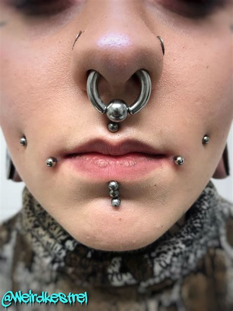 dahlia piercing corner of mouth done with internally threaded titanium jewellery other