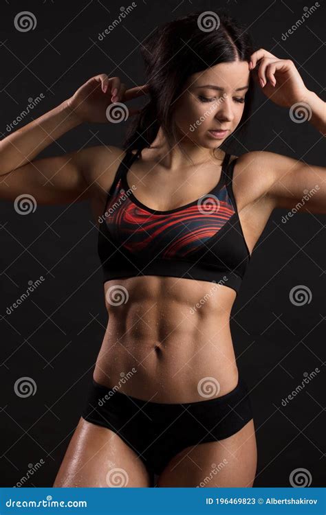 unrecognizable woman showing off her perfect muscular ripped abs close up stock image image