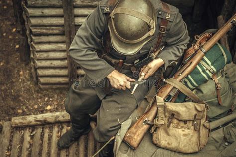 Military Reenactor Of The Second World War Shooting A Rifle In The