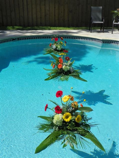 An order of floating flowers for pool wedding usually includes not only a small bouquet of a bride, but also a boutonniere from the same collection, which the transport, that delivers you floating flowers for pool wedding is equipped with a device for creating comfortable for flowers microclimate. Pool Floats, Flowers for the Pool. | Floating pool ...