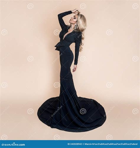 Elegant Fashion Stunning Blonde Woman In Elegant Long Black Dress On