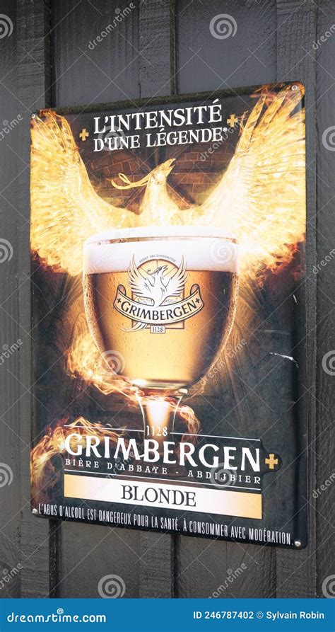 Grimbergen Belgian Abbey Beers Sign Text And Logo On Wall Facade